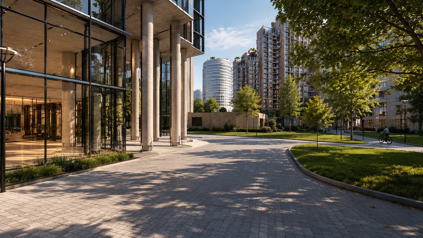 Ground level — glass lobby colonnade opening onto the plaza
