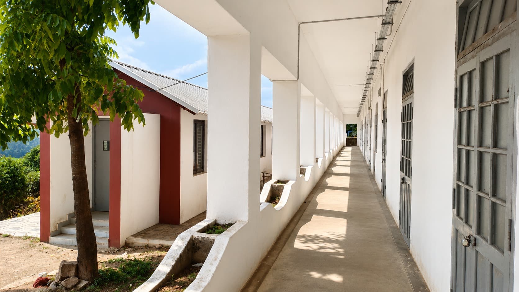 Corridor — repainted verandah linking classroom blocks