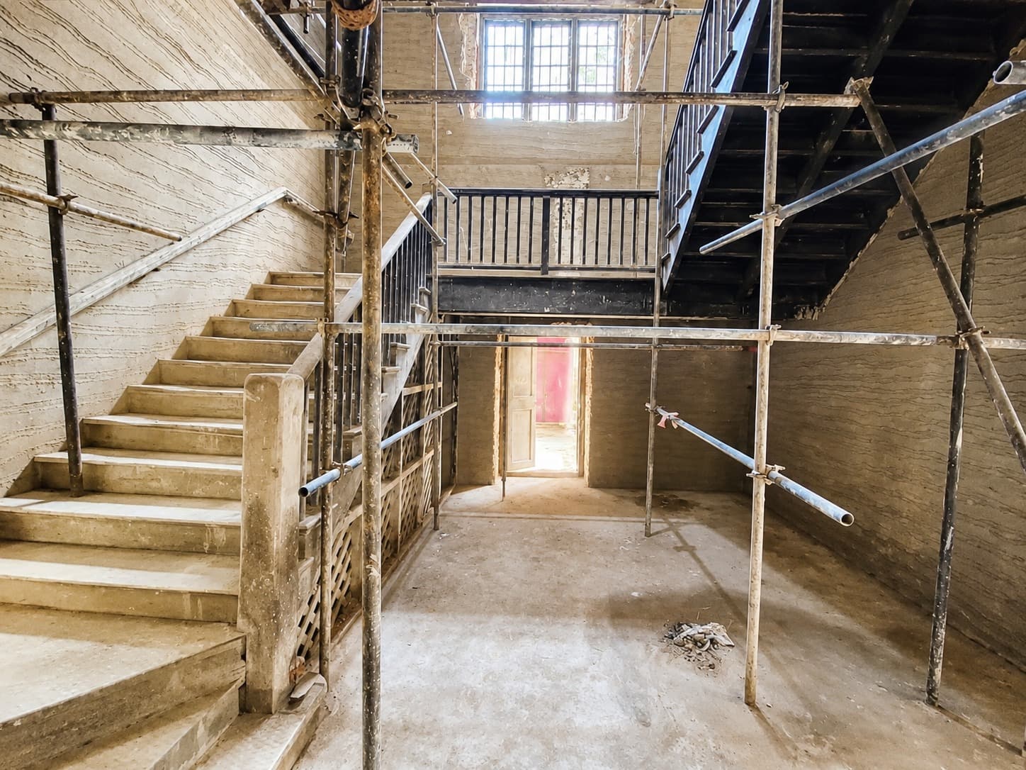 Principal stair — timber staircase and iron balustrade, phased repair